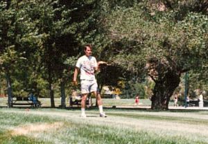 Dan Koon playing catch on the sports field at Golden Era Productions 1990s.